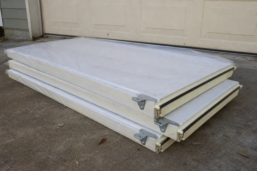 New insulated door sections on the driveway in Topeka, KS
